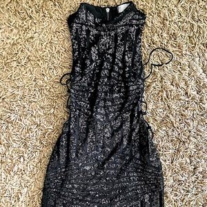 Amazing Sequin LF Rumor mini dress with side cutouts!